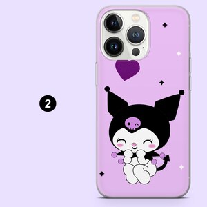 May include: A lilac phone case with a cartoon character design. The character has a black hood with a skull, a white face, and is holding purple orbs. A purple heart floats above the character. The case has a glossy finish.