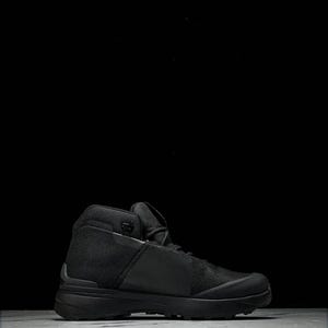 May include: Black high-top hiking boot with a mesh and leather design. The boot features a thick sole and a padded collar for ankle support. The overall design is sleek and modern, suitable for outdoor activities.