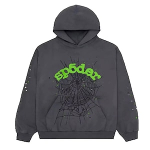May include: Dark gray hoodie with a hood and a front pocket. The front features a green "sp5der" text above a black spiderweb design. Green paint splatters are scattered around the design. White paint splatters are on the sleeves.