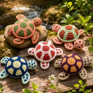 May include: Five crocheted turtle toys featuring colorful shells in various patterns. The turtles are crafted with yarn in shades of peach, green, red, white, blue, purple, and yellow, each displaying distinct geometric shell designs and small black eyes.