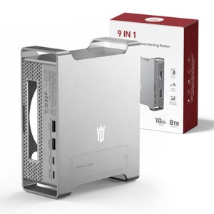 May include: A silver 9-in-1 docking station with a handle, ports, and a logo. The box next to it has the text "9 IN 1" and "10GB 8TB". The product is designed to connect multiple devices.