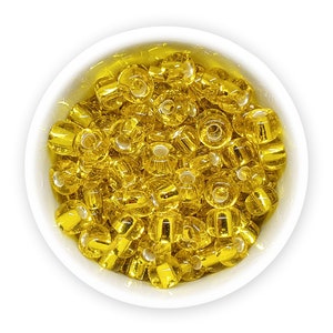 Perline pony ceche 2/0 20g Perline di semi trasparenti foderate in argento giallo Preciosa Ornela NR 551