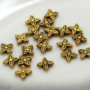 Metal Flower Beads 6mm (20) Antiqued Gold colour last shimmer