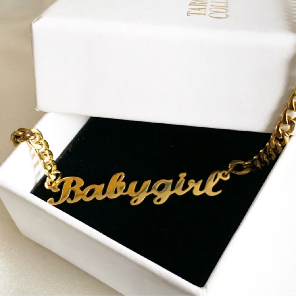 Gold necklace that says baby Clearance