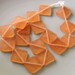 Apricot Indonesian handmade resin diamond beads 4mm x 24mm 17pcs. per strand