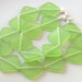 Spring Green Indonesian handmade resin diamond beads 4mm x 24mm 17pcs. per strand