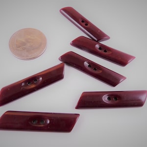 21 vintage mahogany brown plastic 2-holed slanted bar button. About 1 7/16 x 3/8" NOS