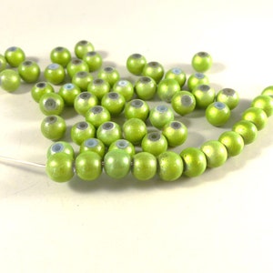 Vintage glowing light green plastic bead - 120 pcs. 8 mm.