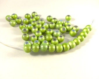 Vintage glowing light green plastic bead - 120 pcs. 8 mm.