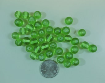 Grass green Indonesian handmade resin round beads  10 mm. 74 pcs.