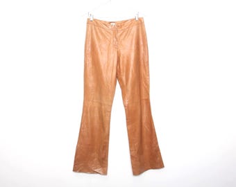 Vintage 90s 00s Faux Leather Flocked Flared Pants/ US 9/ 1990s