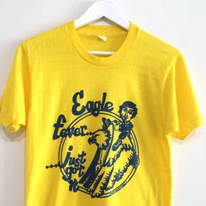 vintage soft EAGLE FEVER hand drawn yellow & blue 1970s paper thin vintage made in the U.S.A t shirt -- size small -- Free shipping U.S.A