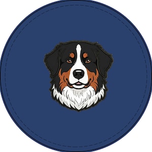 May include: A circular navy blue patch featuring a detailed illustration of a Bernese Mountain Dog head. The dog has black, white, and tan fur, brown eyes, and a white blaze on its face. The patch has a stitched border around the edge.