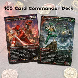 May include: Two collectible trading cards titled 100 Card Commander Deck. One card features Jason Lee Scott as the Red Ranger with a red robot, and the other features Tommy Oliver as the Green Ranger with a green robot, both with game text.