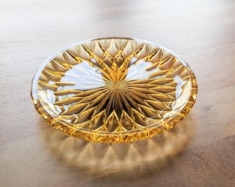 Vintage Schale aus bernsteinfarbenem Pressglas mit sternförmigem Sonnenblumenmotiv