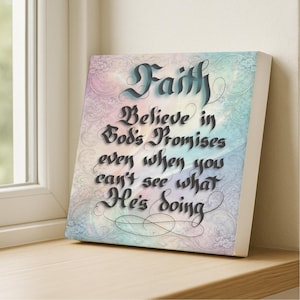 May include: A square canvas wall art piece featuring a pastel watercolor background in shades of pink, blue, and purple with a decorative floral scroll pattern. The text reads Faith Believe in God's Promises even when you can't see what He's doing.