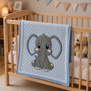 May include: A light blue crochet baby blanket with a gray elephant applique. The elephant has large ears, a trunk, and is sitting down. The blanket is displayed on a wooden crib with a teddy bear.