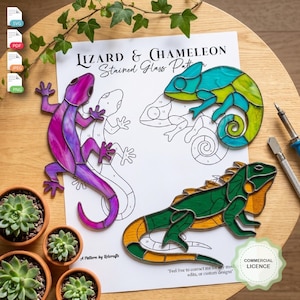 May include: A paper sheet titled Lizard & Chameleon Stained Glass Pattern featuring line drawings of three reptiles. Three finished stained glass pieces are placed on top: a purple lizard, a blue and green chameleon, and a green iguana.
