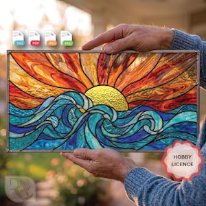 May include: A stained glass panel depicting a sunset over ocean waves. The sun is a textured gold, with orange and red rays. The waves are shades of blue and teal. The panel is held by hands. The image includes file type icons and a "HOBBY LICENCE" badge.