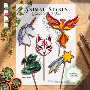 May include: A digital pattern sheet titled ANIMAL STAKES Stained Glass Pattern featuring five designs: a unicorn, a fox mask, a phoenix, a dragon, and a shooting star. The sheet includes SVG, PDF, JPEG, and PNG icons, a commercial license badge, and tools.