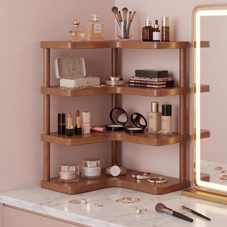 May include: A four-tier wooden corner shelf organizer with a smooth finish, designed to hold cosmetics, jewelry, and beauty accessories. The shelves are arranged in an L-shape, featuring various bottles, lipsticks, compacts, and jewelry cases.