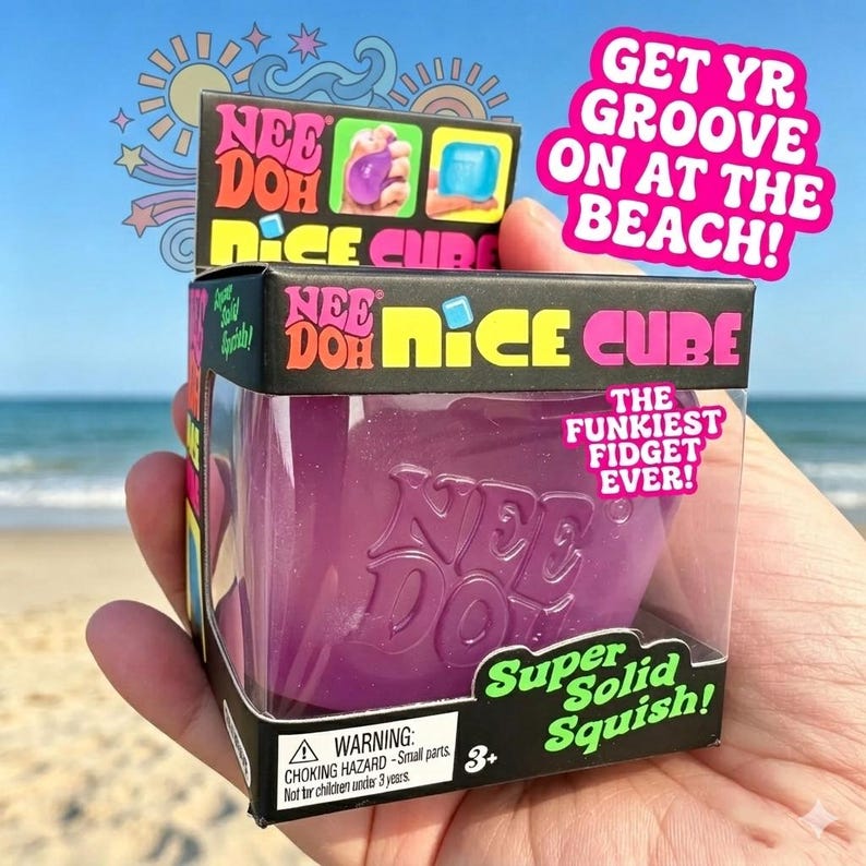 May include: A Nee Doh Nice Cube fidget toy in a clear plastic box. The purple cube is labelled "Super Solid Squish!" and "The Funkiest Fidget Ever!" The box has the text "Get Yr Groove On At The Beach!" and a warning about small parts.
