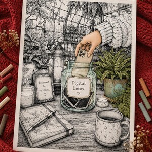 May include: A detailed black and white illustration of a glass jar labeled Digital Detox with a heart symbol, containing smartphones. A hand places a phone inside. Nearby are a notebook, a pen, a mug with star patterns, and a framed sign reading disconnect to reconnect.