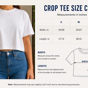 May include: A white crop tee shirt with a crew neck, paired with blue jeans. The image includes a size chart with measurements in inches for width and length. The chart shows sizes S, M, and L.