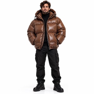 May include: A glossy brown puffer jacket with a high collar and a hood, worn over a black turtleneck sweater and black cargo pants. The jacket features a front zipper closure and horizontal quilted panels, paired with black lace-up boots.