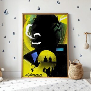 May include: A rectangular framed poster featuring a stylized graphic illustration with a prominent black silhouette of a head against a bright yellow background. The artwork includes the text Cyberpunk and a smaller silhouette of two figures.