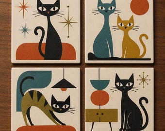 May include: Set of four square ceramic coasters with mid-century modern cat designs. Each coaster features a different cat illustration in black, teal, and gold, with geometric shapes and starburst accents. The coasters are set against a cream background.