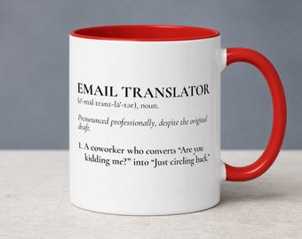 May include: A white ceramic mug with a bright red interior and handle. The front features black text that reads: EMAIL TRANSLATOR (e-mal tranz-la-ter), noun. Pronounced professionally, despite the original draft. 1. A coworker who converts Are you kidding me? into Just circling back.