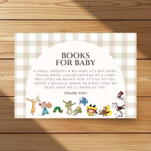 May include: A rectangular card with a beige and white checkered pattern and the text "BOOKS FOR BABY". The card includes a request to bring a book instead of a card, with illustrations of storybook characters.