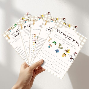 May include: A collection of children's storybook-themed game cards. The cards feature illustrations of storybook characters and games like "Unscramble the Children's Story" and "Name That Storybook." The cards have a beige and white checkered pattern.