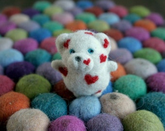 Felted bear with hearts -miniature bear