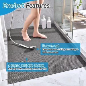 May include: A gray, textured anti-slip bath mat with the text "Product Features", "Easy to cut", and "S-shape anti slip design". The mat is in a shower stall with white bottles and a shower head.