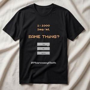 May include: A black short-sleeved t-shirt featuring orange pixelated text that reads 1:1000 1mg/mL SAME THING? followed by three grey rectangular buttons labelled Yes, No, and Ignore with a mouse cursor, and the hashtag #PharmacyMath in white.