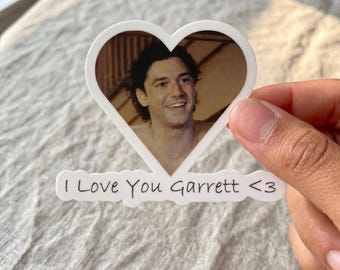 Lindas pegatinas troqueladas con el logo de "Te amo Garrett" en forma de corazón. Accesorios y regalos para mamás.