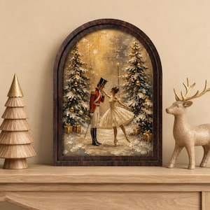 May include: An arched wall art piece featuring an oil painting of a nutcracker soldier in a red uniform and a ballerina in a white dress dancing in a snowy forest with Christmas trees and gold gift boxes under a warm golden light.