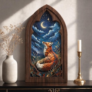 May include: A pointed arch wooden frame containing a textured painting of a fox looking up at a crescent moon in a starry night sky. The fox has orange and white fur, and the background features blue clouds and small yellow plants.
