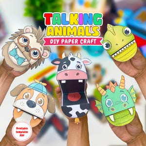 Op de afbeelding: Een set van vijf papieren dierenpoppen, waaronder een egel met een bril, een groene hagedis, een koe met een open mond, een hond met een blauwe pet en een groene draak. De tekst TALKING ANIMALS DIY PAPER CRAFT staat bovenaan.