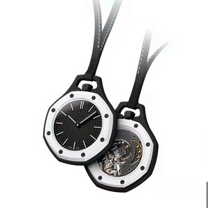 May include: Two octagonal pendant watches with black textured dials and white bezels secured by eight screws. One watch displays a standard clock face with white hands, while the other reveals an intricate mechanical movement with visible gears.