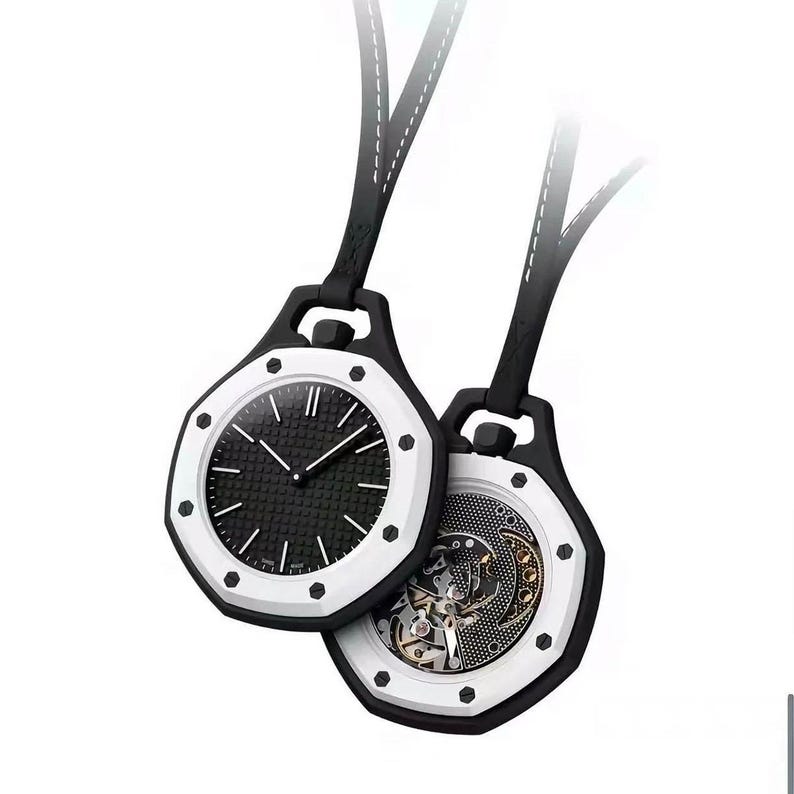 May include: Two octagonal pendant watches with black textured dials and white bezels secured by eight screws. One watch displays a standard clock face with white hands, while the other reveals an intricate mechanical movement with visible gears.