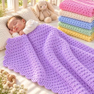 May include: A stack of six crocheted baby blankets in pink, cream, blue, green, yellow, and purple. Each blanket features a consistent textured stitch pattern and a scalloped edge. The purple blanket is draped in the foreground, showcasing the detail.