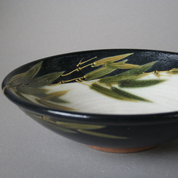 handmade stoneware black serving bowl w/ green bamboo decor in Asia/Craftsman style