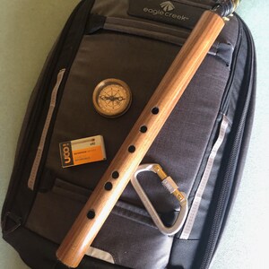 bamboo saxes on a wooden coloured bag