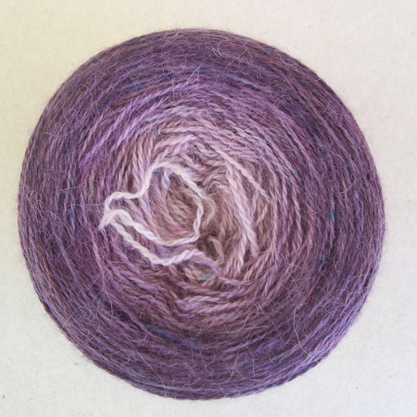 Decadence: 2ply Laceweight Baby Alpaca, Cashmere and Silk blend gradient dyed knitting yarn.  Colourway - Speckled Aubergine
