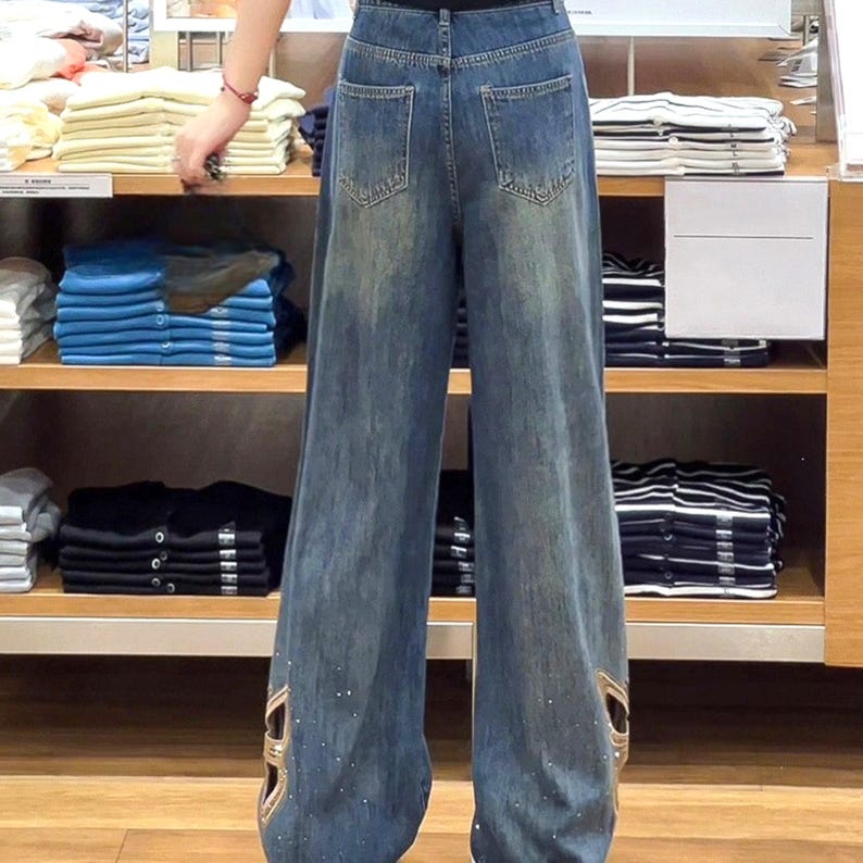 Cutout Embroidered Jeans | Wide Leg Denim Pants | Daily Wear | Y2K Streetwear Style

Wide leg denim jeans with butterfly embroidery and relaxed Y2K streetwear design