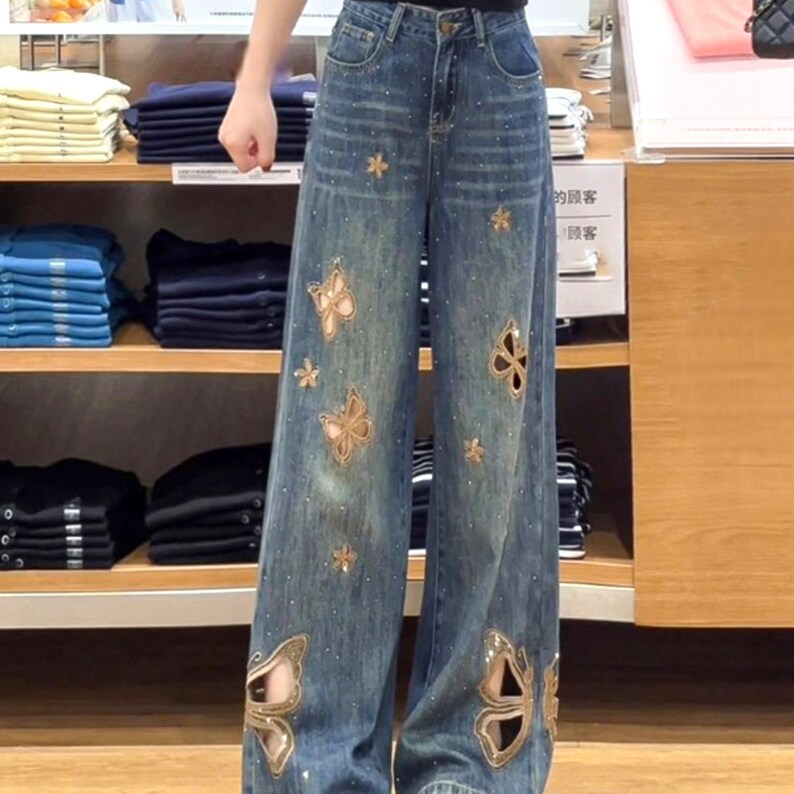 Cutout Embroidered Jeans | Wide Leg Denim Pants | Daily Wear | Y2K Streetwear Style

Wide leg denim jeans with butterfly embroidery and relaxed Y2K streetwear design