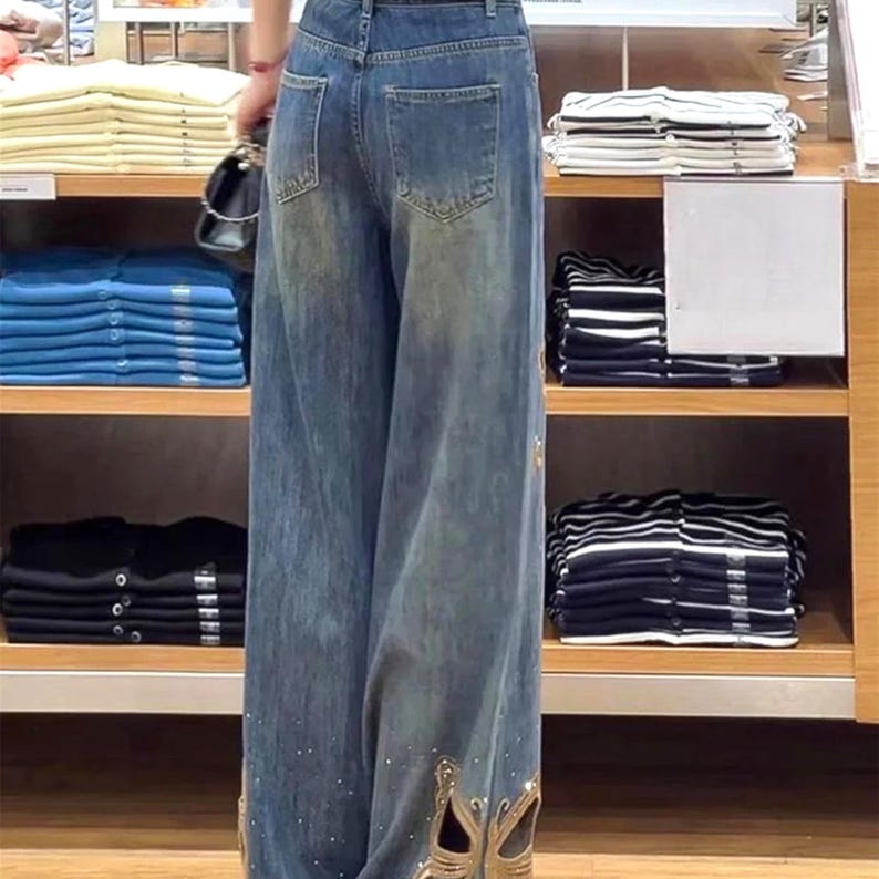 Cutout Embroidered Jeans | Wide Leg Denim Pants | Daily Wear | Y2K Streetwear Style

Wide leg denim jeans with butterfly embroidery and relaxed Y2K streetwear design